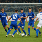 A live soccer match between Empoli and Modena in Serie B, with players on the field and a scoreboard showing 0-0.